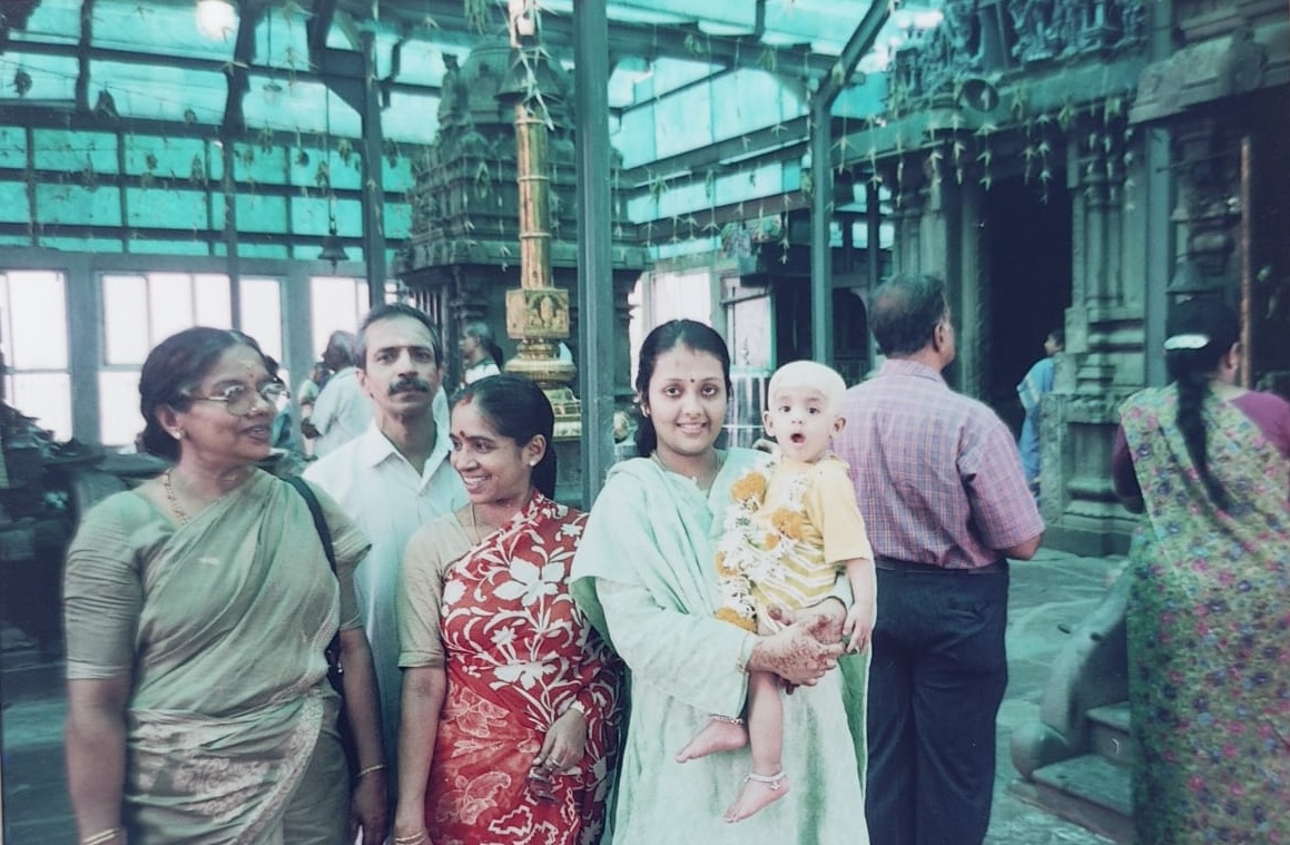 Anusha's hair-shaving ceremony at Murugan Temple