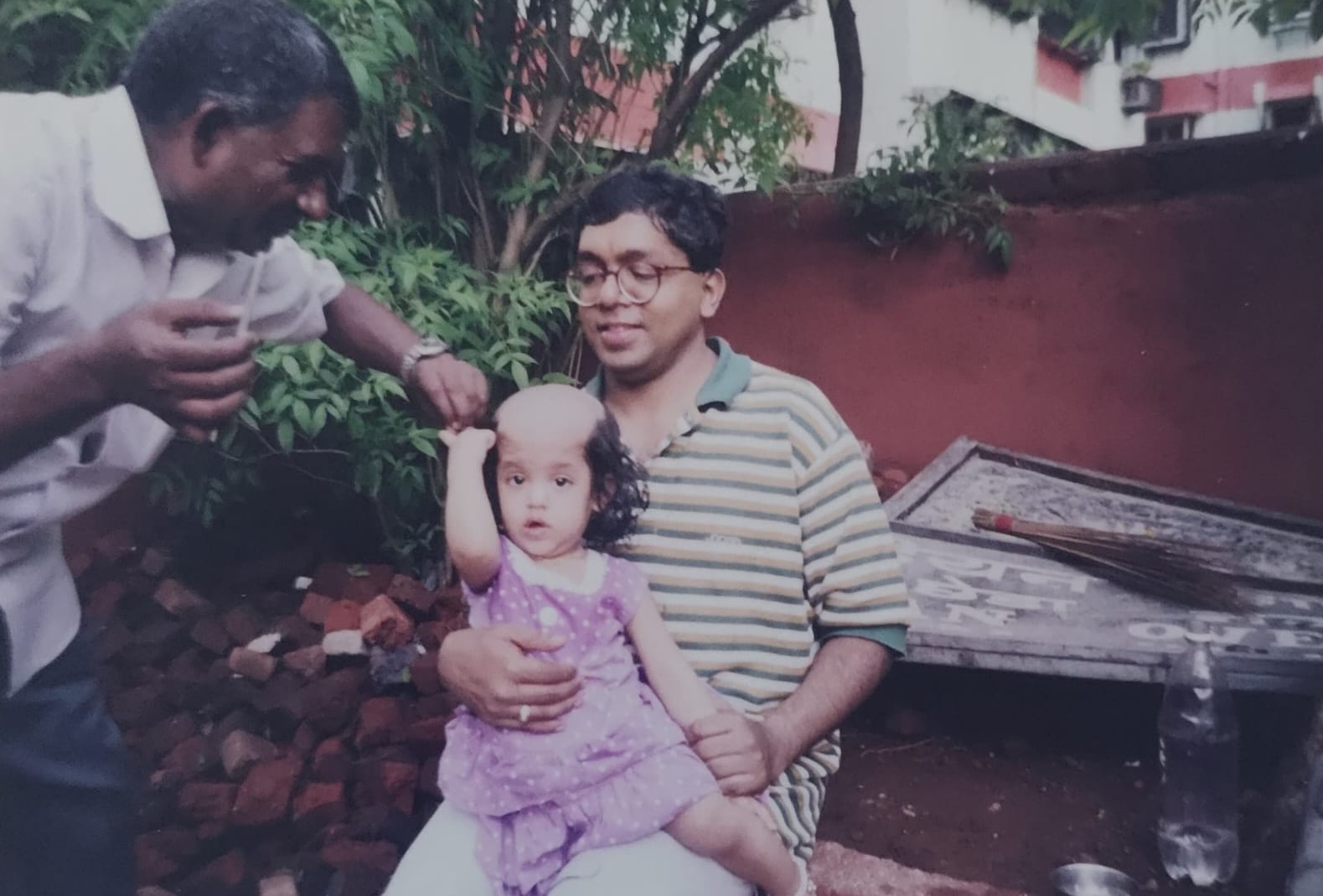 Anusha's hair-shaving ceremony